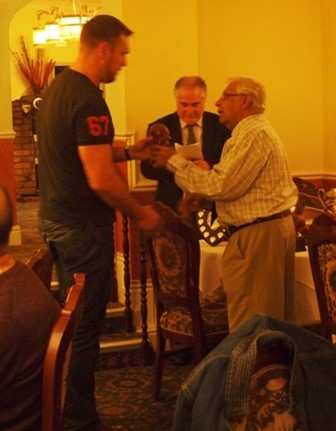 Jon Hunt receives award from Percy Bulsara